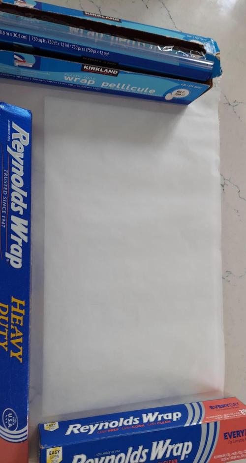 Bubble Hash 2026. Week 1 - Plastic wrap, paper towel, and parchment paper on top.